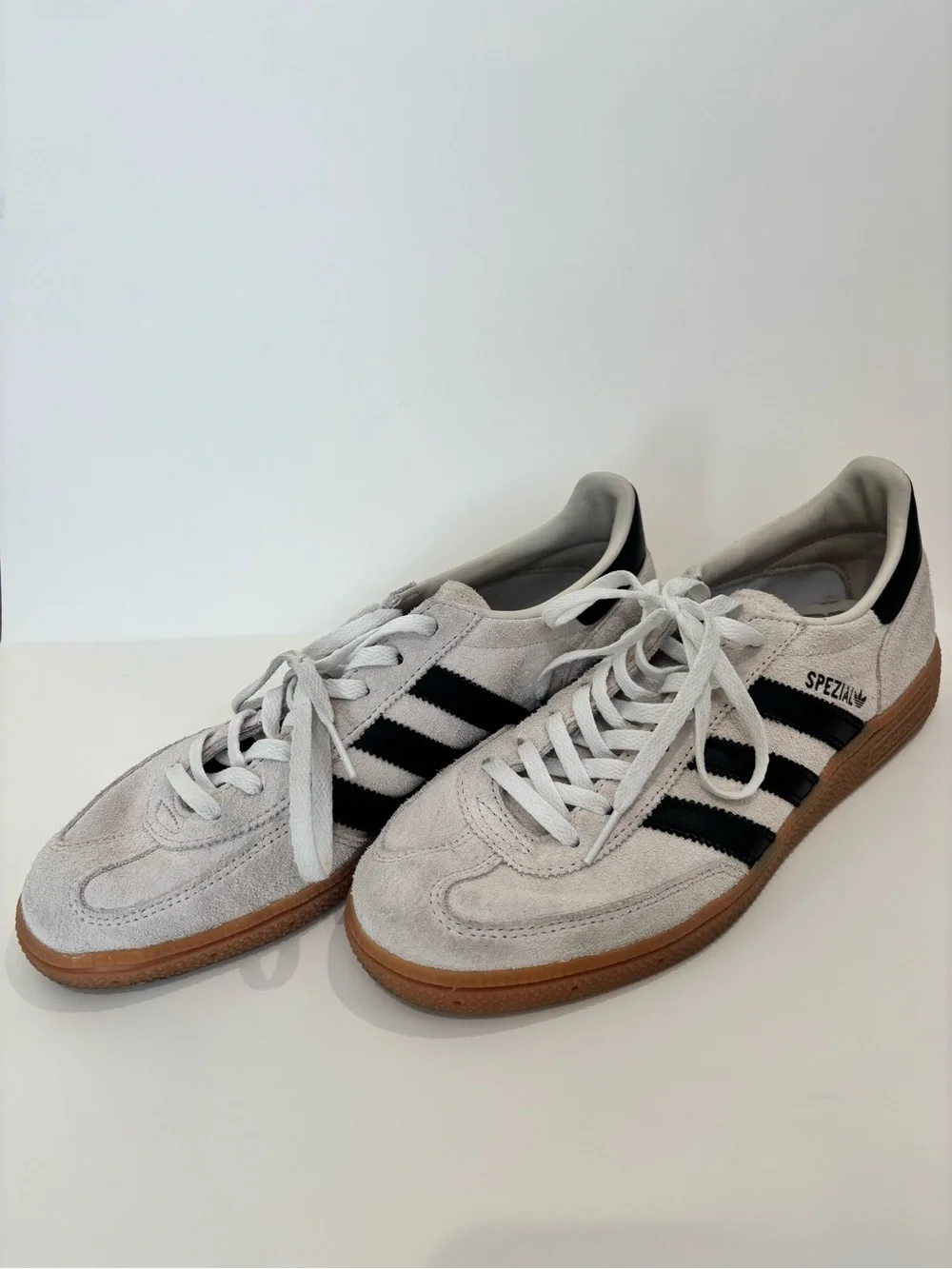 adidas Suede Sneakers in White with Black Stripes and Gum Sole
